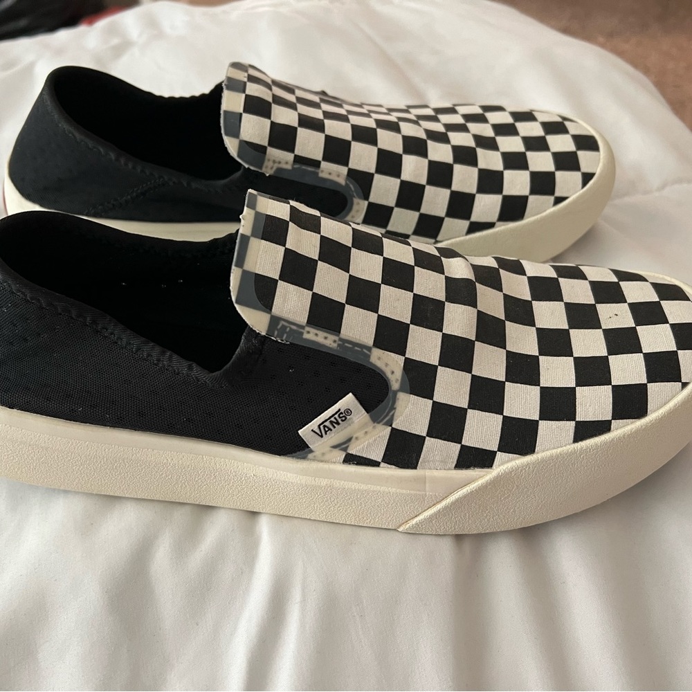 Checkerboard Comfy Cush slip on Vans. Hard to find these anymore.